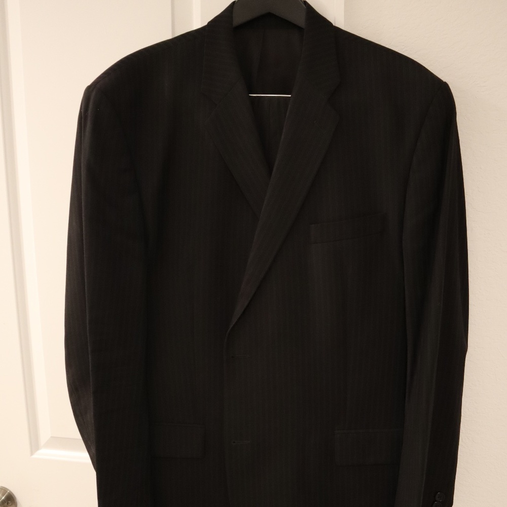 Men’s CK suit, 48L/40W, black w/gray stripe, two-button, like new.